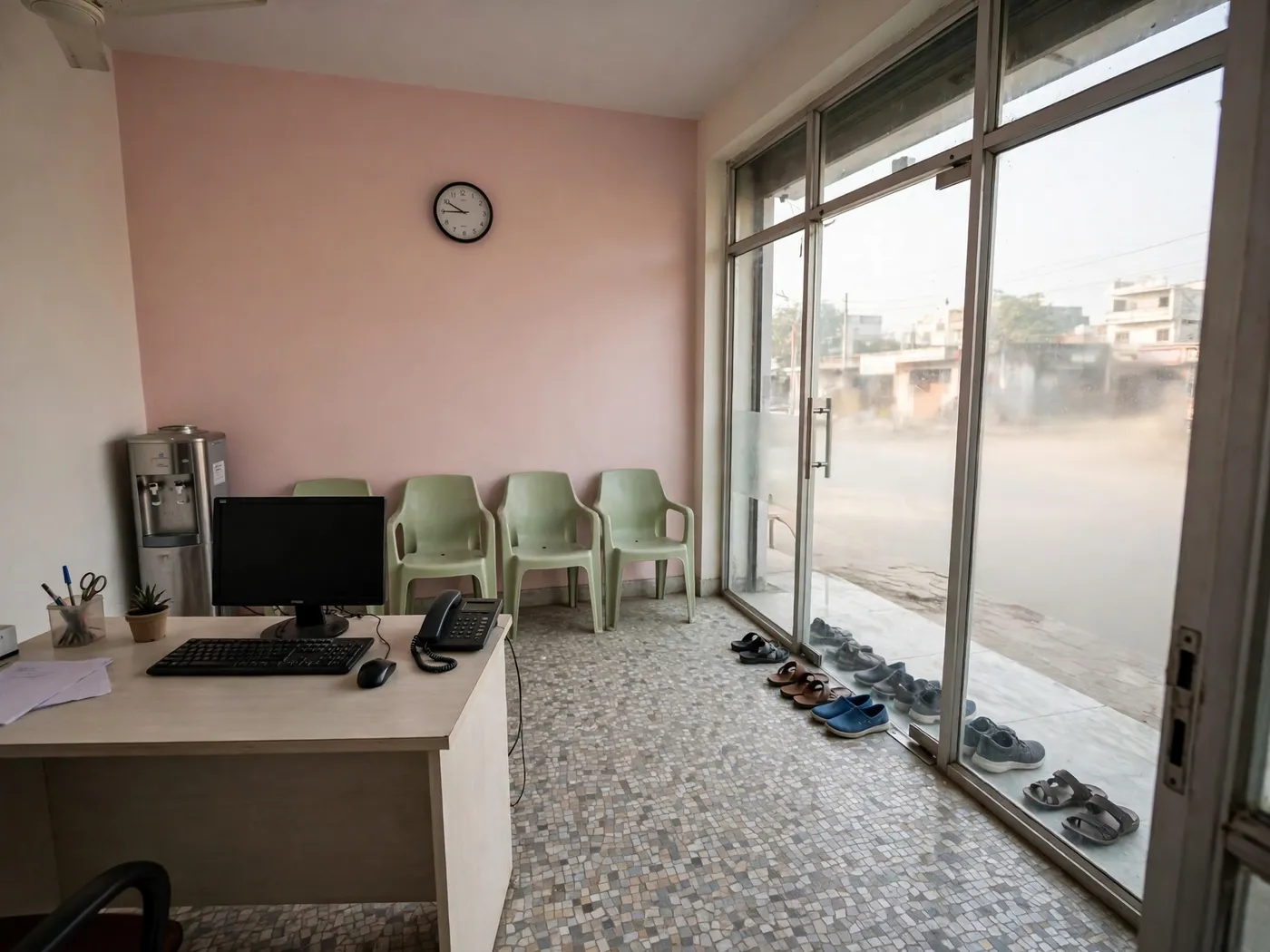 Reception at Soni Dental Care — the desk, the waiting chairs and the water dispenser